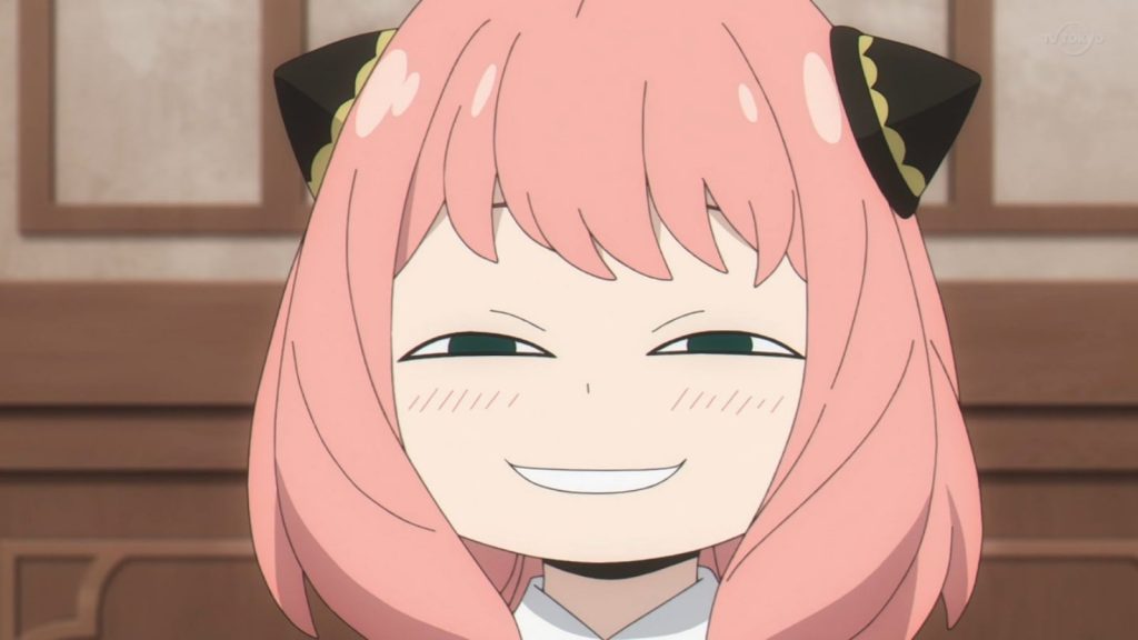 "Spy x Family" anime screenshot showing Anya with her world famous memetic "Nyeh" smirk.