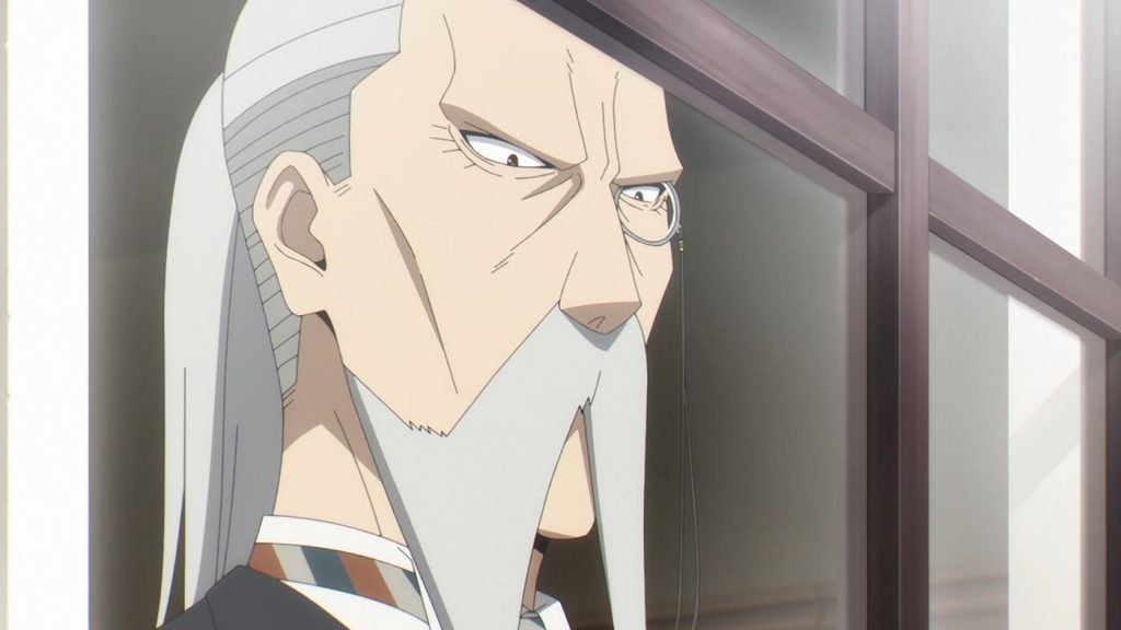 "Spy x Family" anime screenshot showing Henry Henderson staring down at the Eden Academy hopefuls.
