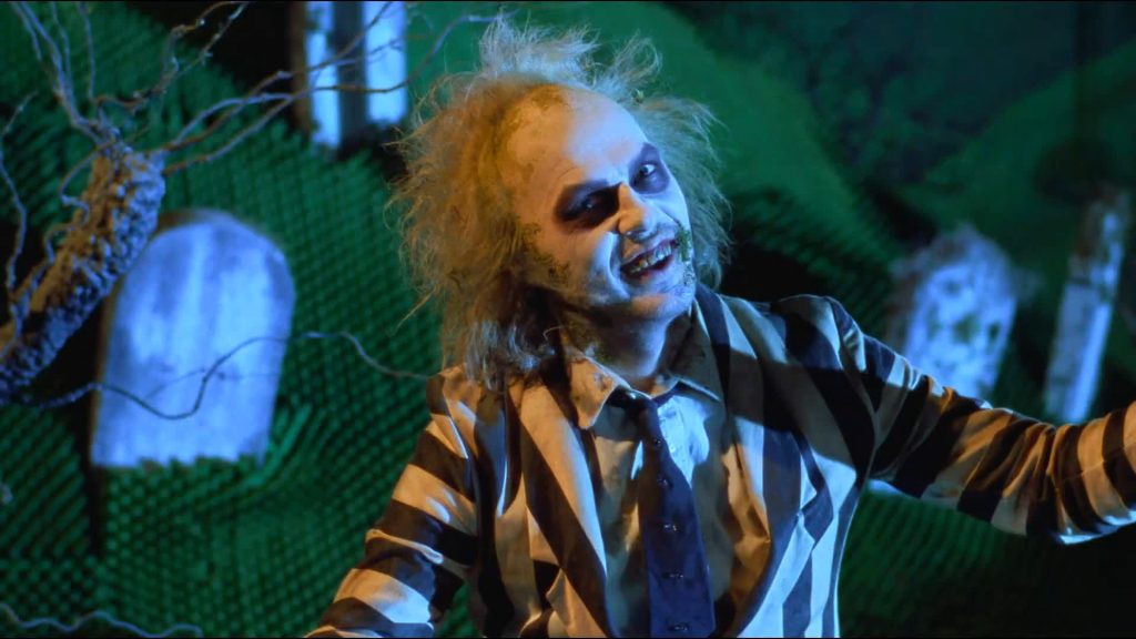 Michael Keaton as Beetlejuice. Beetlejuice 2 premieres in 2024.
