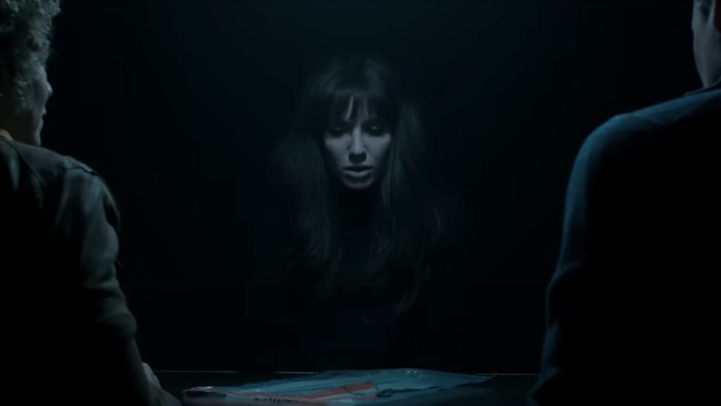 Annabelle Wallis as Madison with police in Malignant