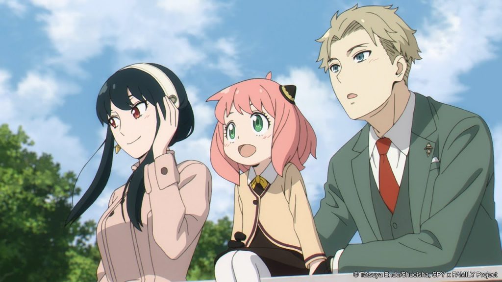 "Spy x Family" promo image, showing the Forger family relaxing on a scenic viewpoint.